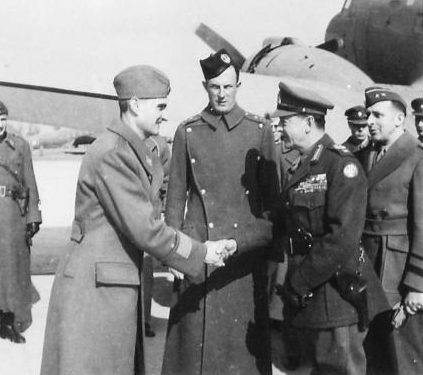 Supreme Commander of the Allied Forces Headquarters in the Mediterranean, Field Marshal Alexander, arrives in Belgrade 21st February 1945 and is greeted by his escort General Arso Jovanović. (IWM, London, photographic archive, NA22516)