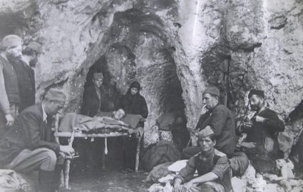 General Draža Mihailović and his staff in a cave somewhere in Serbia. This image is included in Colonel Bailey's report on medical conditions with the JVuO dated April 1944. (National Archives, London, Document HS7-202)