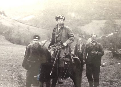 Sergeant McFarlane moving with JVuO guides through Serbia. (Personal photographic collection of Mr. Harry Fenney)