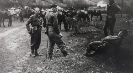 British officers with Partisans take a break on the march. (IWM, London, photographic collection 9507-15)